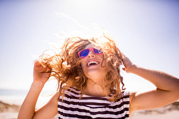 Teen girl happy in sun